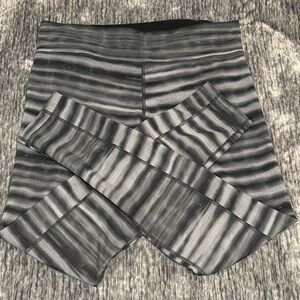 Under Armour Black and Gray Striped Leggings. EUC.